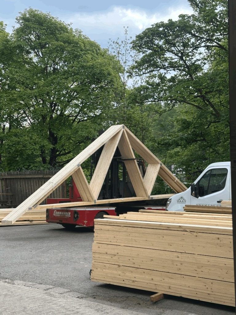 Roof Trusses getting taken to be loaded onto the truck