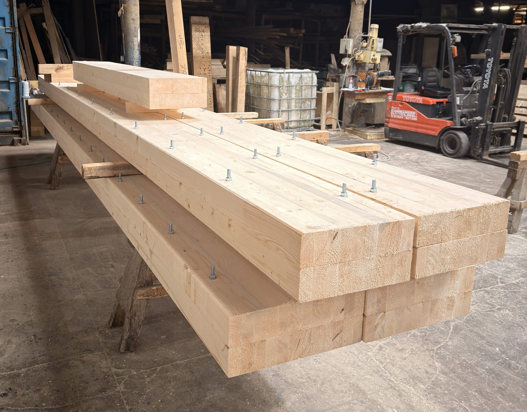 Oversized bolted glulam beams manufactured to bespoke specification at Dunscar Timber Engineering Bolton