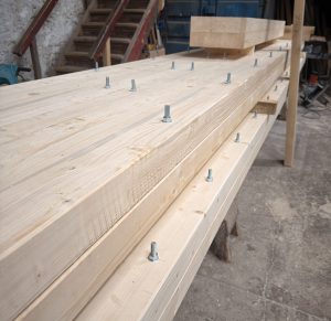 Bespoke glulam beams bolted together to achieve oversized structural specification
